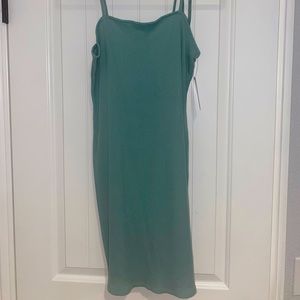 Teal mini dress with tie straps size Medium.